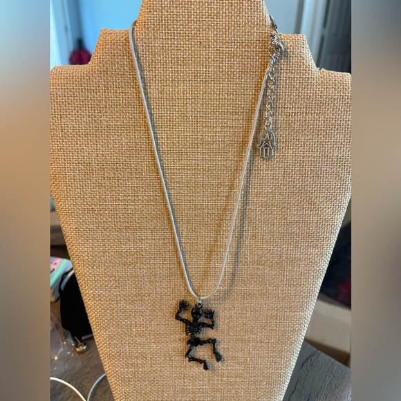 Dalé Jewelry - Dancing skeleton necklace in black on light cord